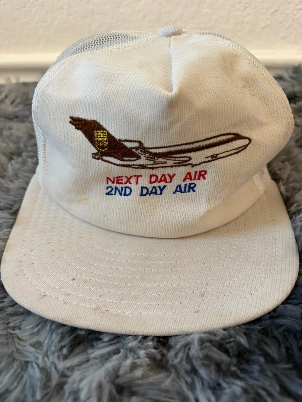 Vintage UPS Next Day Air Trucker Hat Mesh Snapback Cap White Airplane Corporate